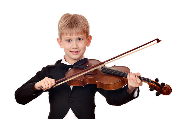 istock boy in tuxedo play violin 166214569