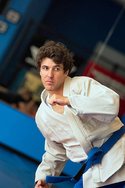 istock Caucasian Martial Arts Athlete in Action 166214796