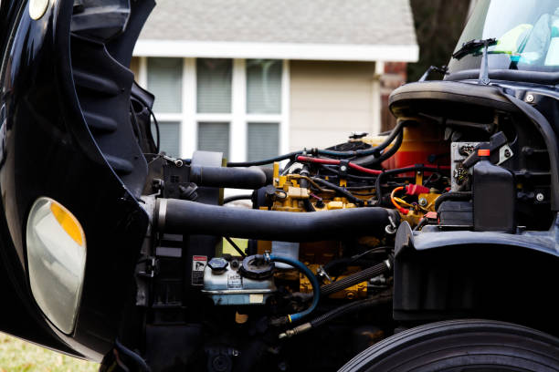 istock Truck Engine Hoses And Wires With House In Background 1662169177