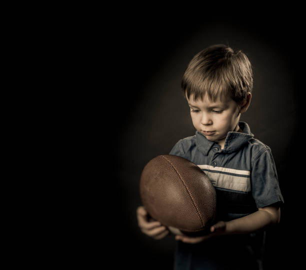 istock Football boy 166221671