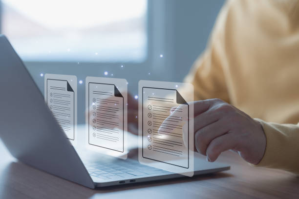 istock Adult man using laptop computer with virtual screen contact questionnaire with checkbox. Document Management Checking System, online documentation database and process manage files. Technology DMS. 1662246531