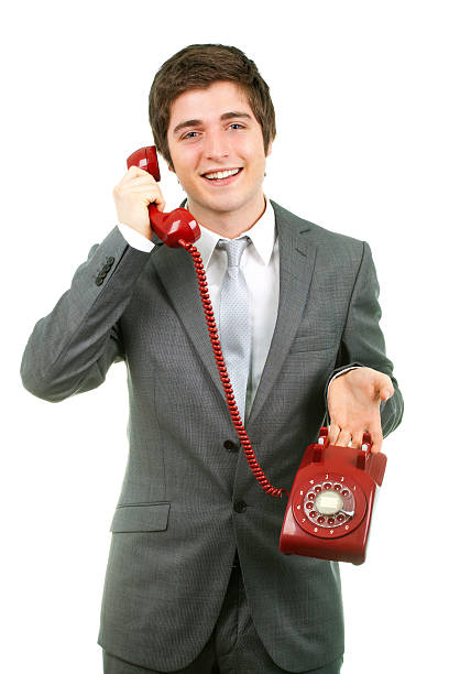 istock Young Businessman with Red Phone 166226039