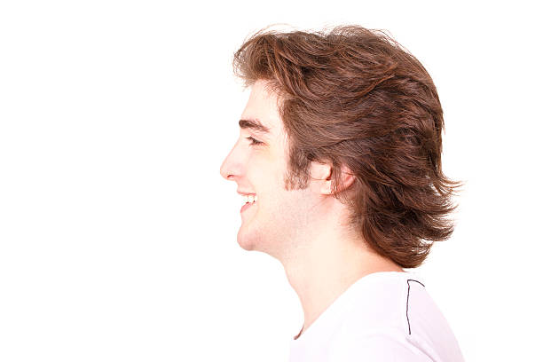 istock Side View of Smiling Young Man 166227109