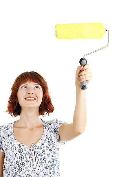 istock Beautiful Woman with Yellow Roller 166227187