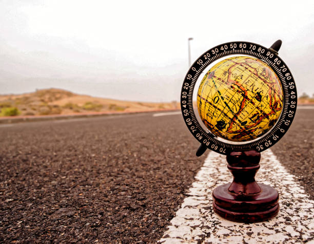 istock Globe Earth on an Asphalt Street 1662283313