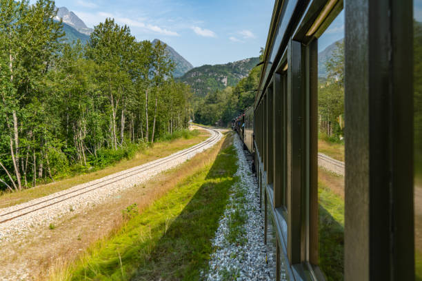 istock White Pass Summit excursion tour train in the mountains, Alaska, USA. 1662285608