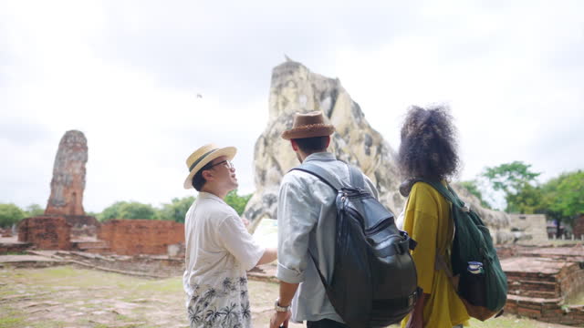 4K Group of Diversity people tourist travel Ayutthaya Province in Thailand on summer holiday vacations.