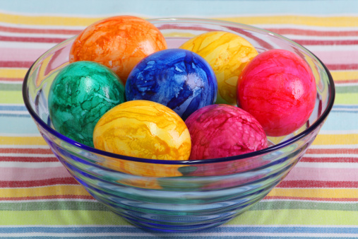 Boiled colorful easter eggs in a bowl