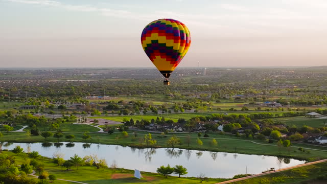 Hot Air Balloons in the morning over Lake