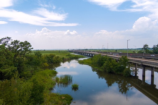 Aerial view of Jubilee Parkway and Mobile Bay on a humid summer day in Alabama