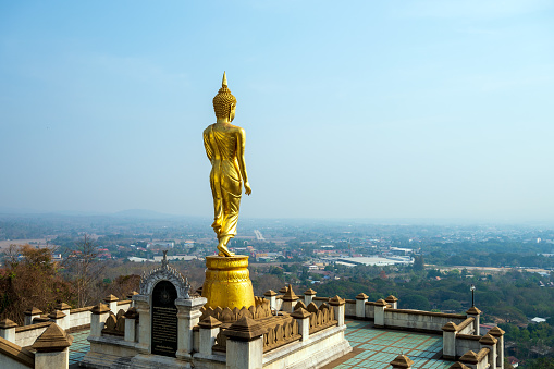 Buddha statue on mountain in Nan province thailand