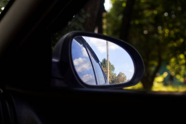 istock View into the side mirror of the car from the passenger compartment 1662374167