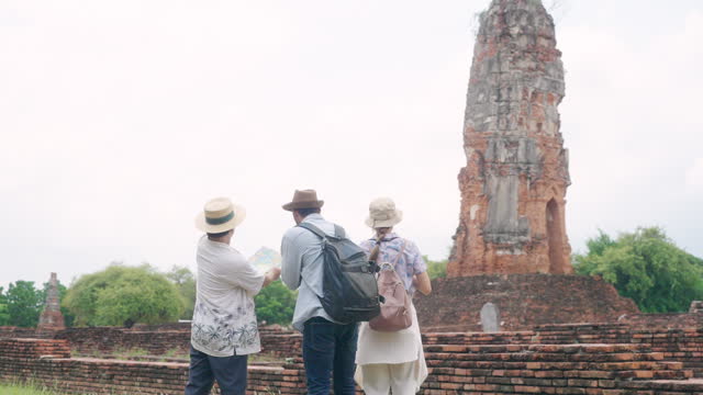 4K Group of Diversity people tourist travel Ayutthaya Province in Thailand on summer holiday vacations.