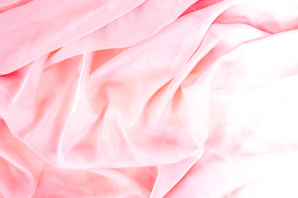 istock Smooth elegant pink silk or satin texture background 1662399897