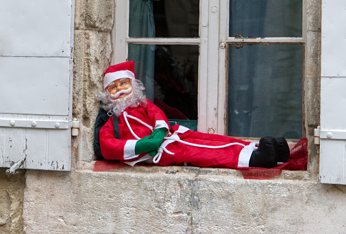 Father Christmas on a window ledge