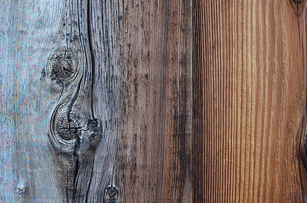 istock Distressed wood texture with knots background detail 166241164
