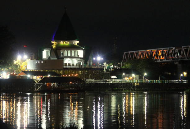 istock Kalimantan water village at night 1662416671