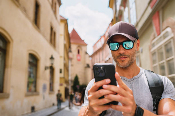 istock Tourist using cell phone to locate during tour. 1662437721