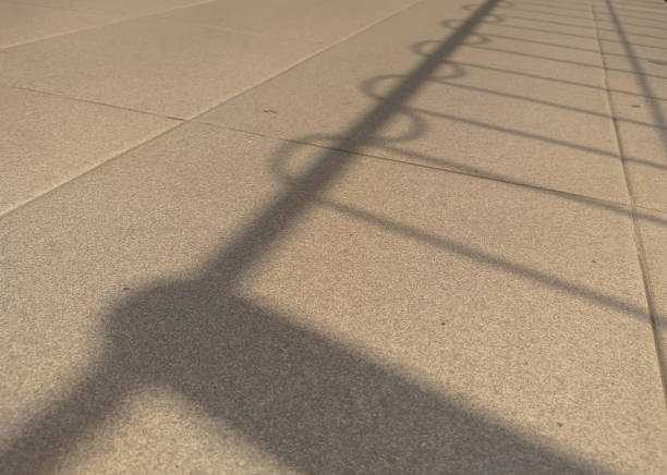 istock Shadow of the hospital back fence 1662449355