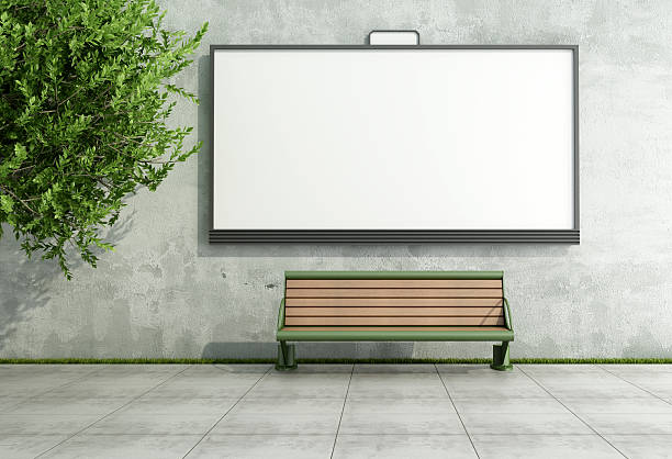 Advertising street bilboard on grunge wall with bench