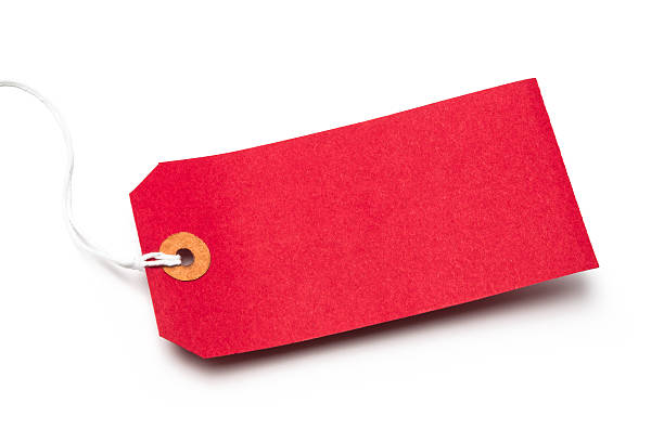 istock Red cardboard or paper luggage tag isolated on white 166253145