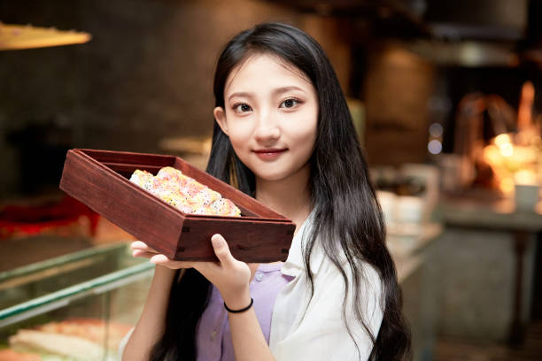 istock A girl eating at a buffet restaurant 1662532952