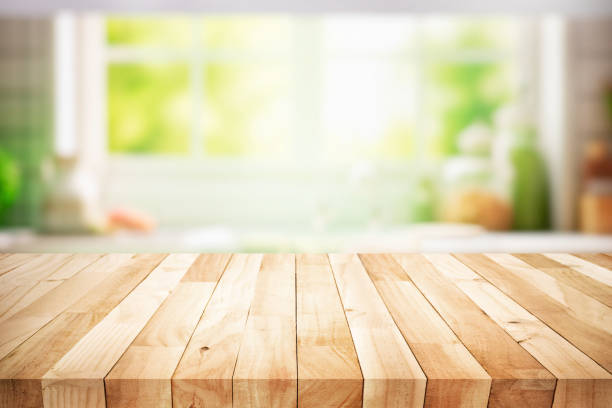 istock Beautiful texture wood table top texture on kitchen wall window in cozy home background 1662585808
