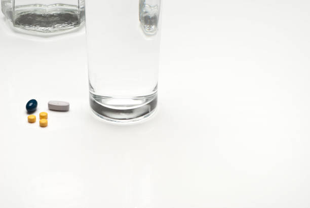 istock Glass with water and medicine. 166258860
