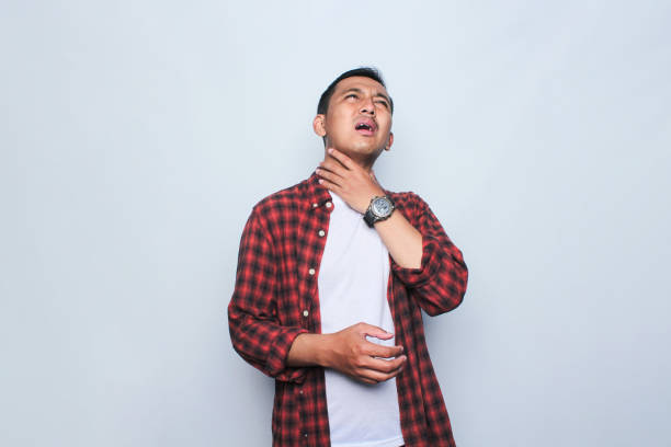 istock Covid symptoms, Sore Throat 1662597349