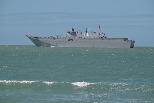 Townsville, Qld - Aug 07 2023: HMAS Adelaide is the second of two Canberra-class landing helicopter dock ships of the Royal Australian Navy and is the largest naval vessel ever built for Australia.