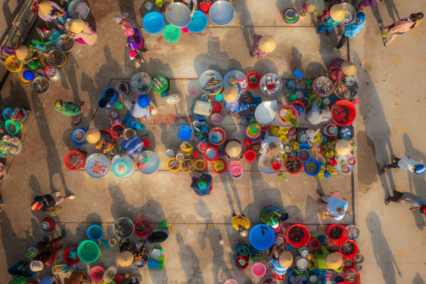 istock Hau Giang crouching market 1662677601