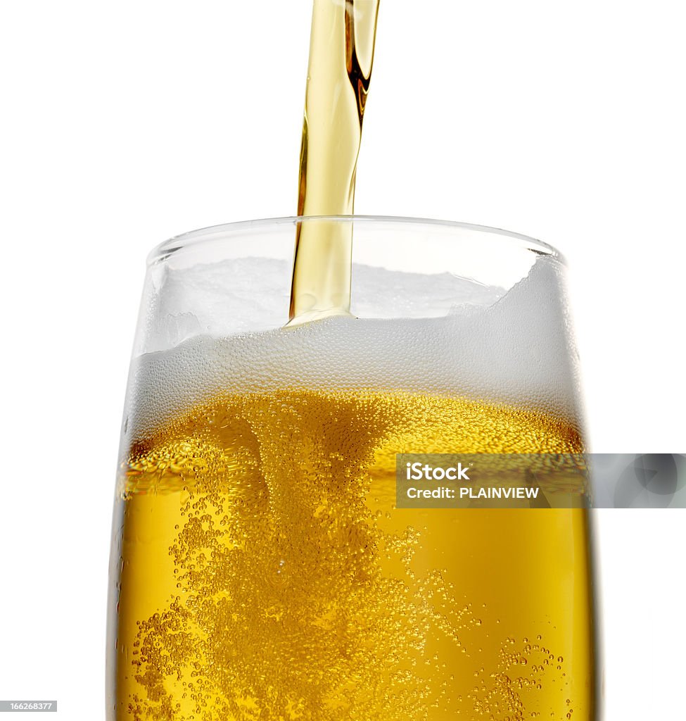 Beer Pouring beer into a glass on white background (+ clipping path) Beer - Alcohol Stock Photo