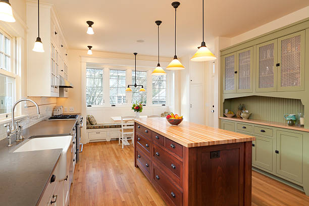Beautiful Updated Kitchen Beautiful kitchen with large island. breakfast room stock pictures, royalty-free photos & images