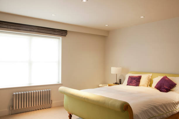 istock Bed and radiator in modern bedroom 166272398