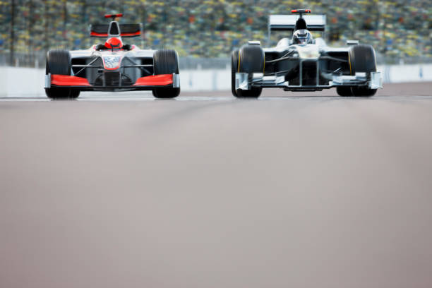 istock Race cars driving on track 166272711
