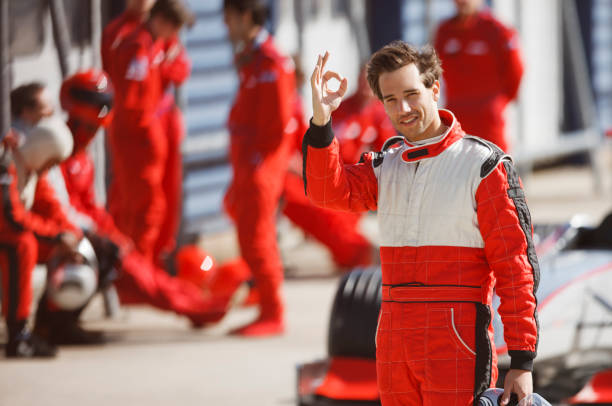 istock Racer making 'OK' sign on track 166272749