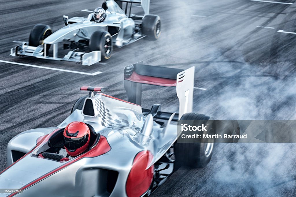 Race cars driving on track  Racecar Stock Photo