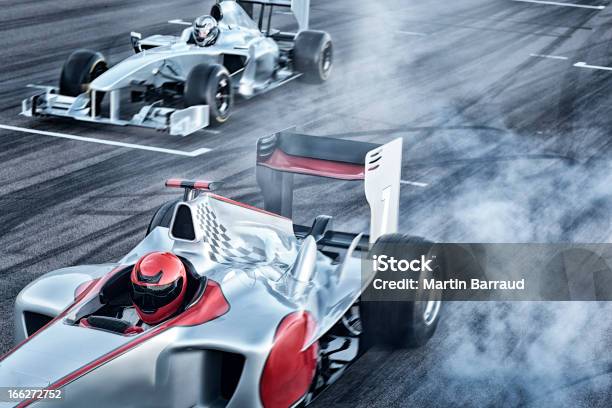 Race Cars Driving On Track Stock Photo - Download Image Now - Racecar, Auto Racing, Starting Line