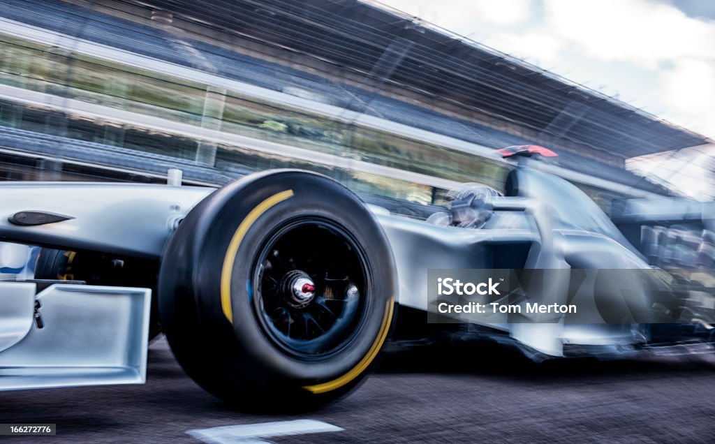 Race car driving on track  Racecar Stock Photo