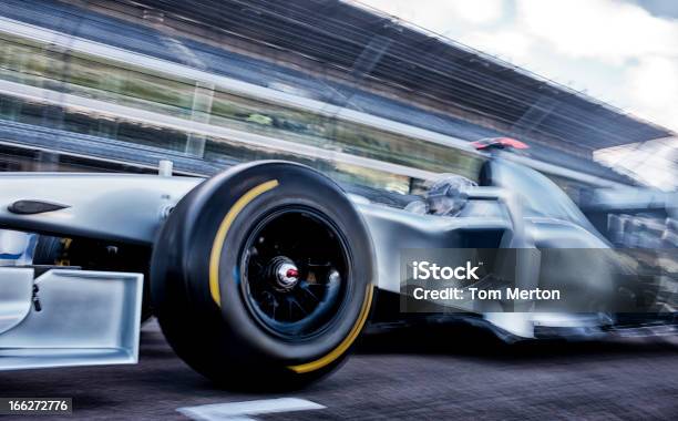 Race Car Driving On Track Stock Photo - Download Image Now - Racecar, Auto Racing, Close-up