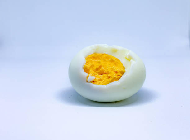 istock Egg bitten off, boiled prepared for the use on a white background. 1662728233