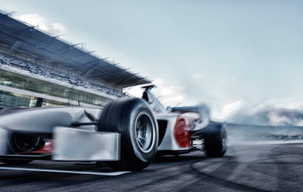 Race car driving on track  auto racing photos stock pictures, royalty-free photos & images