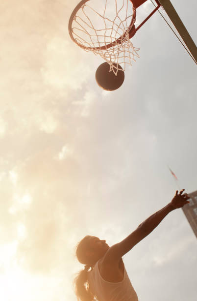 istock Man playing basketball on court 166273756