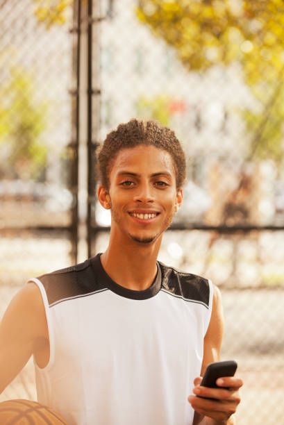 istock Man standing on basketball court 166273766