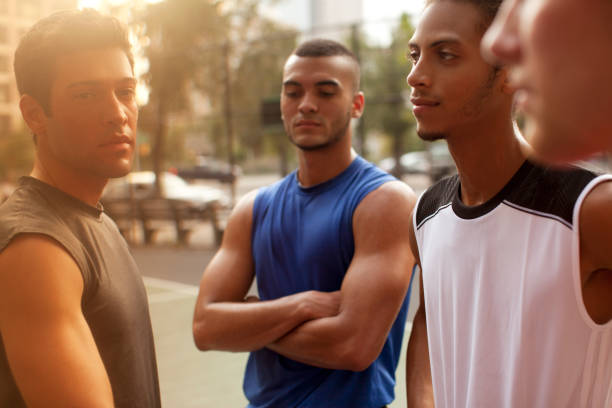 istock Men standing on basketball court 166273767