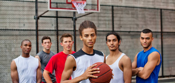istock Men standing on basketball court 166273799