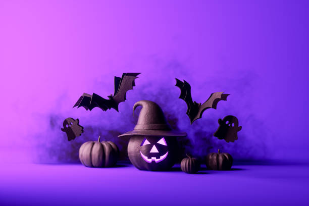 istock Halloween decorations with pumpkins, bats and ghosts on purple background 1662745325