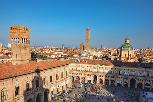 Bologna, Italy - March 5, 2023: High angle view on historical buildings in Piazza Maggiore on a clear day in the center of Bologna, Italy