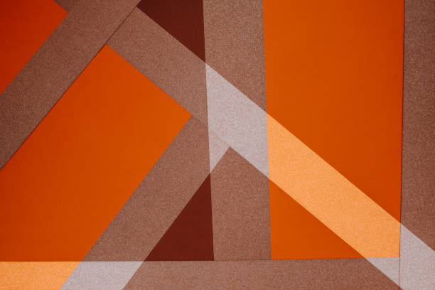 istock paper geometric background in brown, orange and silver colors.Color blocking background. broken lines background in warm colors. Wallpaper graphic.Abstract graphic background 1662766629