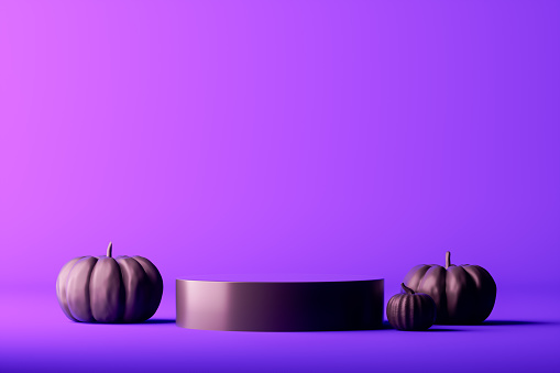 Halloween podium with pumpkins on purple background. Digitally generated image.